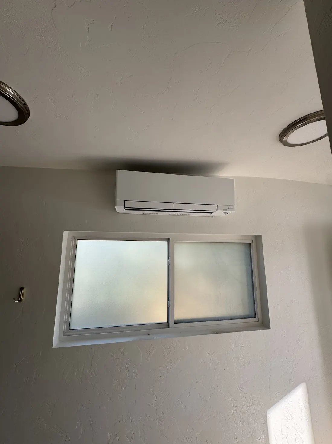 Mini-split above a window